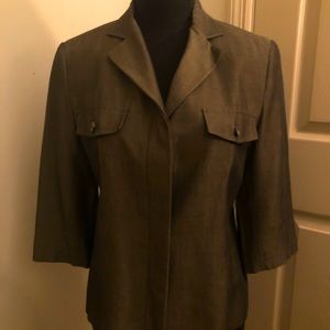 Jacket top, polished fabric is Rayon, wool, cashmere with 3/4 length sleeves.